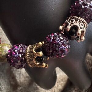 Purple and Gold Beaded Bracelet with Intricate Spacers